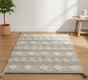 A gray and beige rug with raised diamond shapes - Vitrine Furniture - Accessories