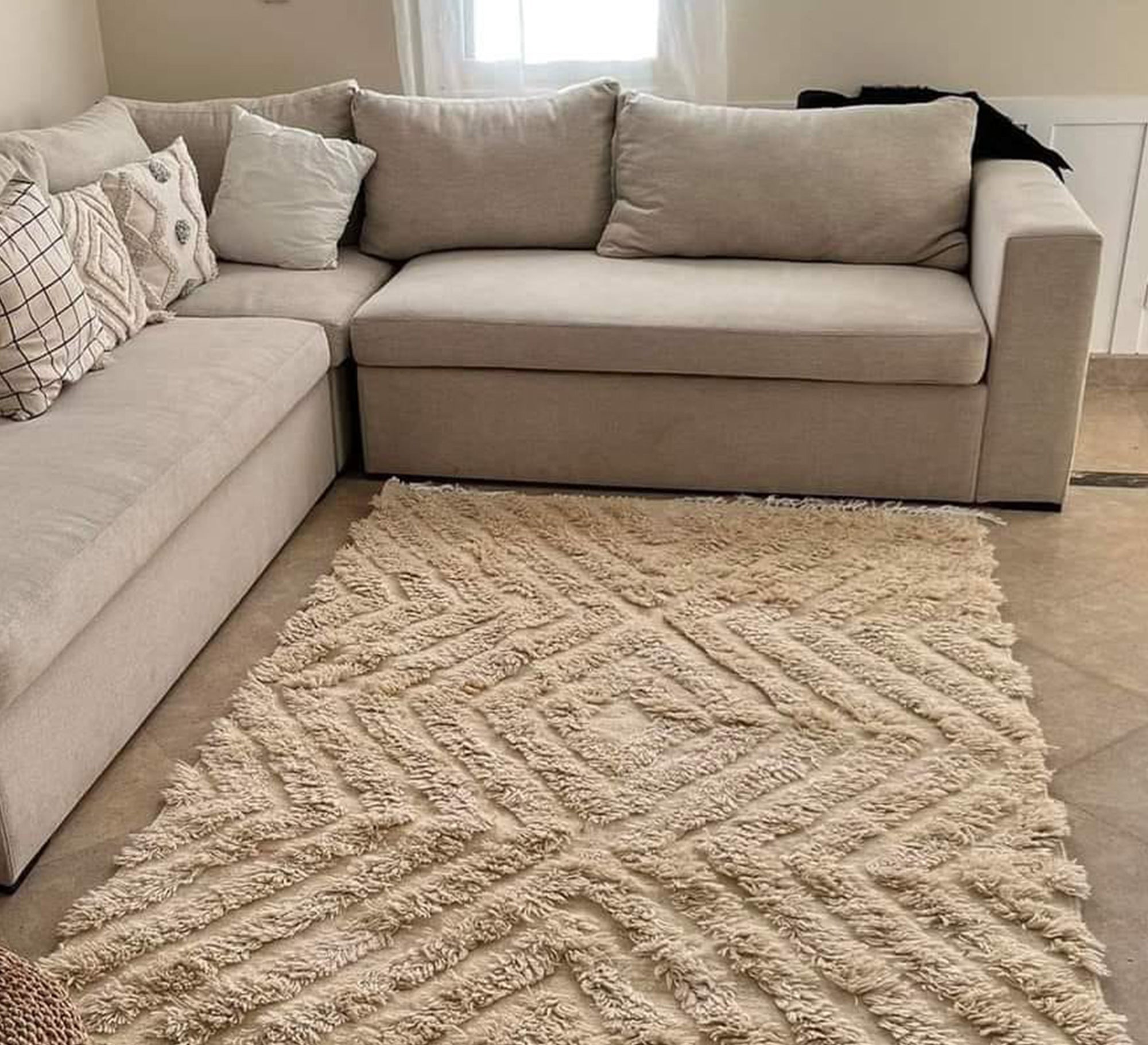 A hand - woven wool rug - Vitrine Furniture - Accessories