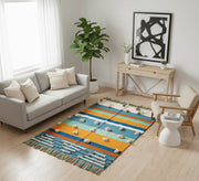 A horizontally striped rug in various colors and with fringe. - Vitrine Furniture - Accessories