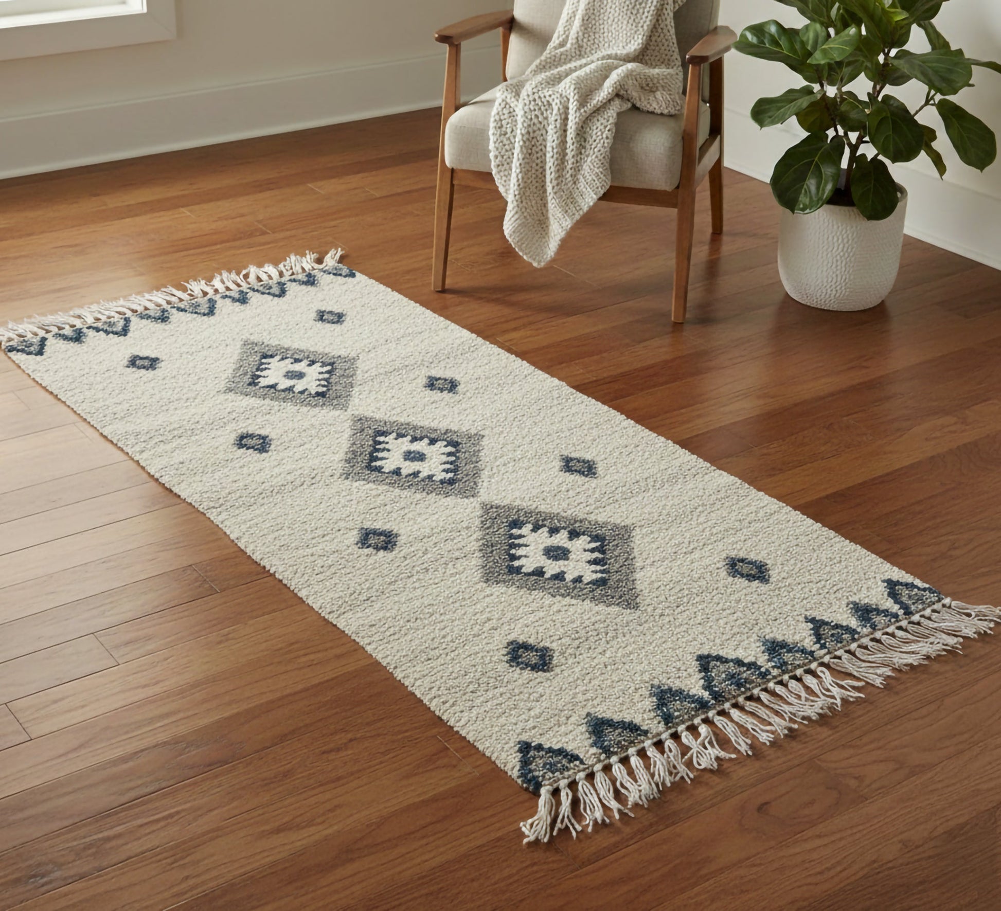 A light gray rug with diamond patterns. - Vitrine Furniture - Accessories