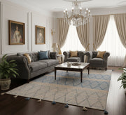 A modern, light blue rug with diamond and striped patterns - Vitrine Furniture - Accessories