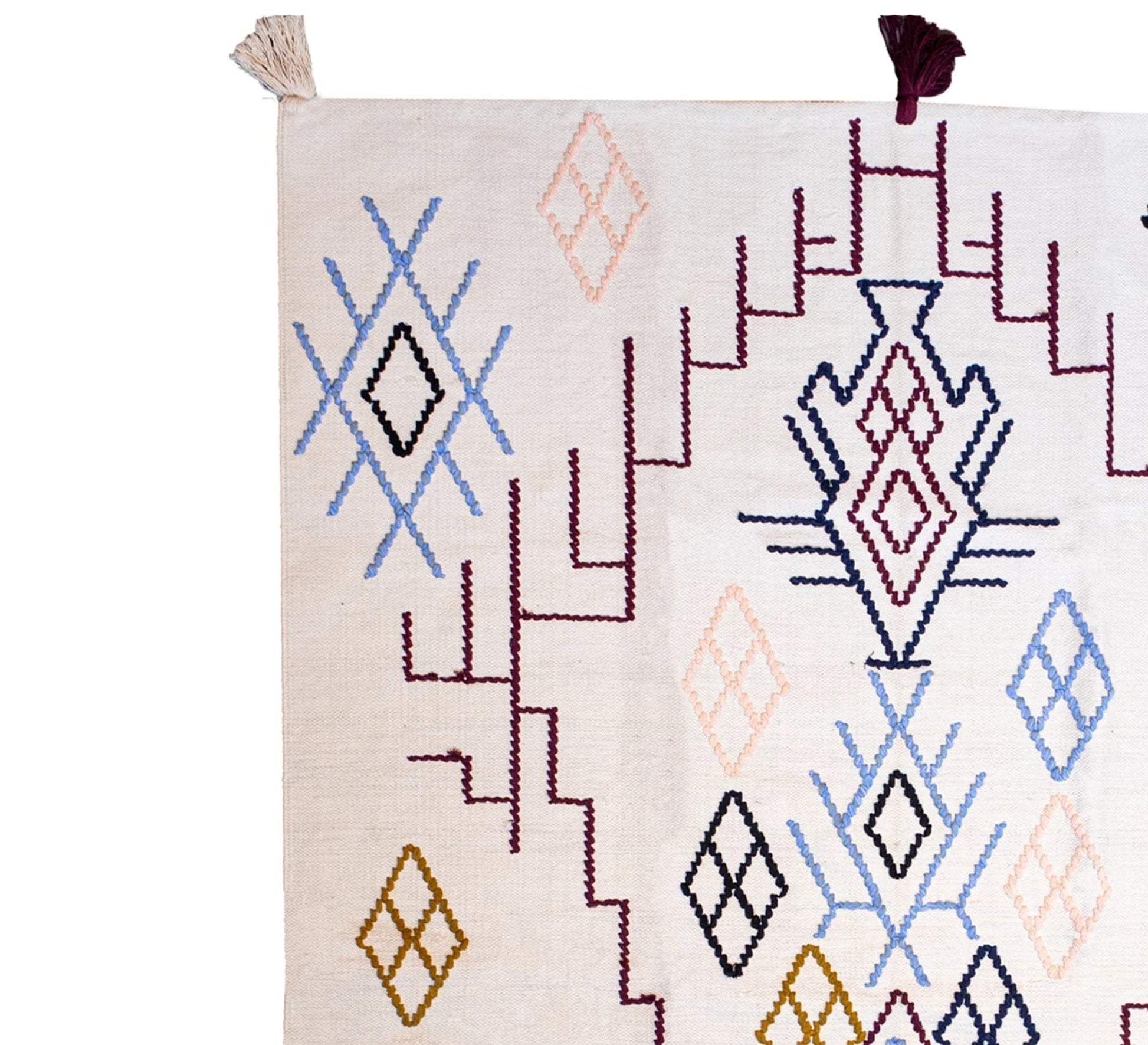A modern, soft, and embroidered Moroccan rug with a diamond pattern and pastel colors - Vitrine Furniture - Accessories