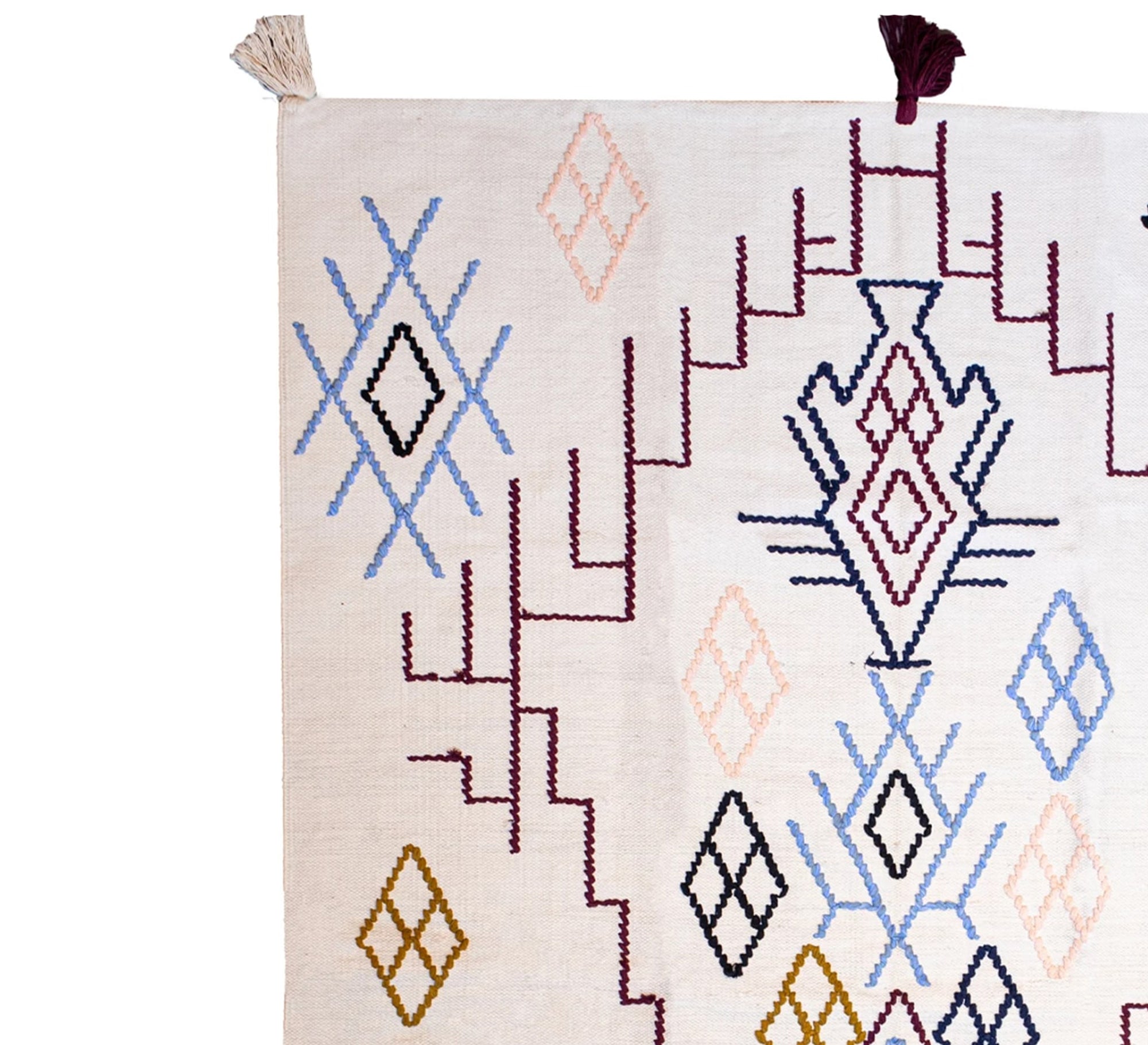 A modern, soft, and embroidered Moroccan rug with a diamond pattern and pastel colors - Vitrine Furniture - Accessories