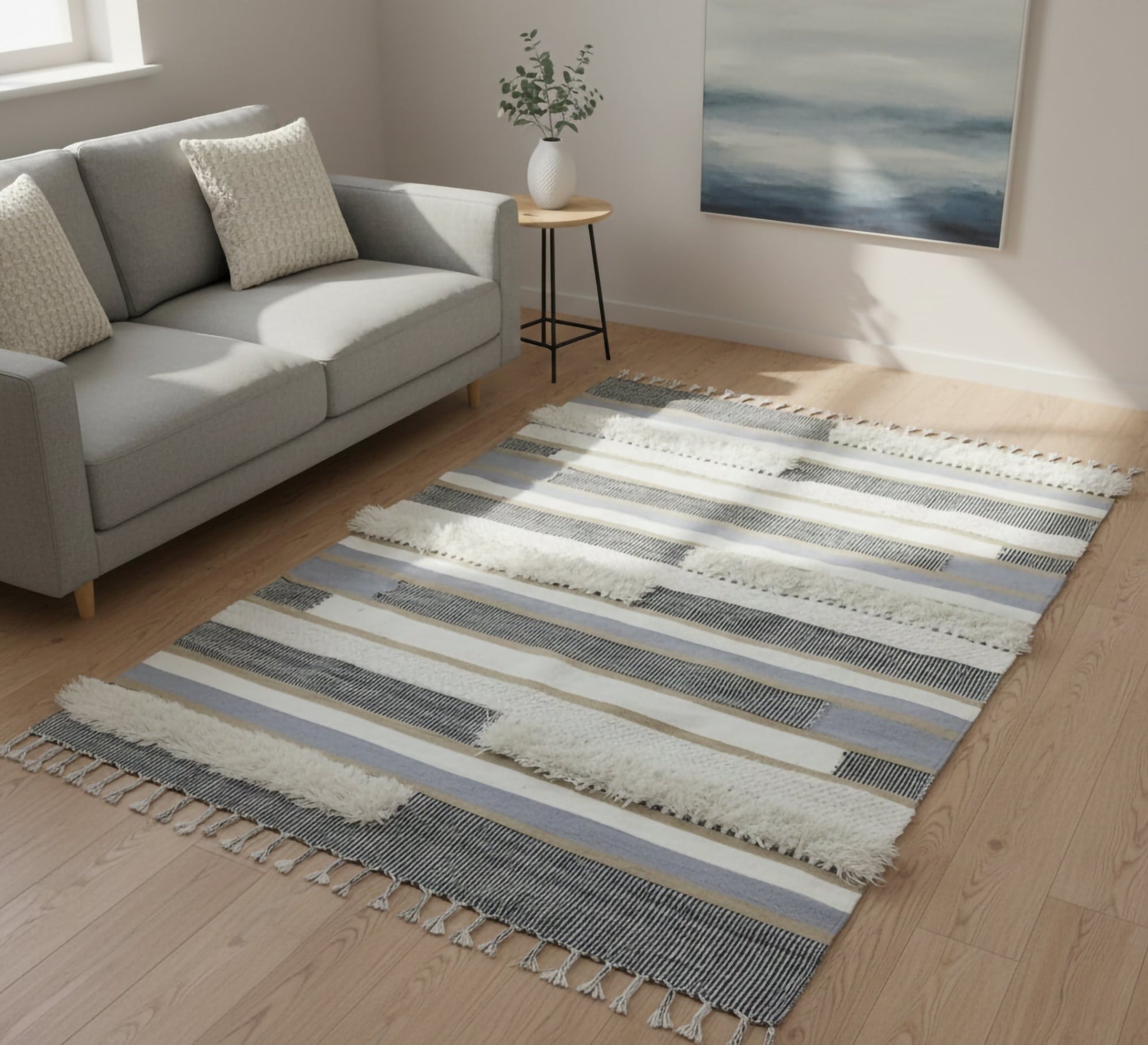 A multi - colored woven rug - Vitrine Furniture - Accessories