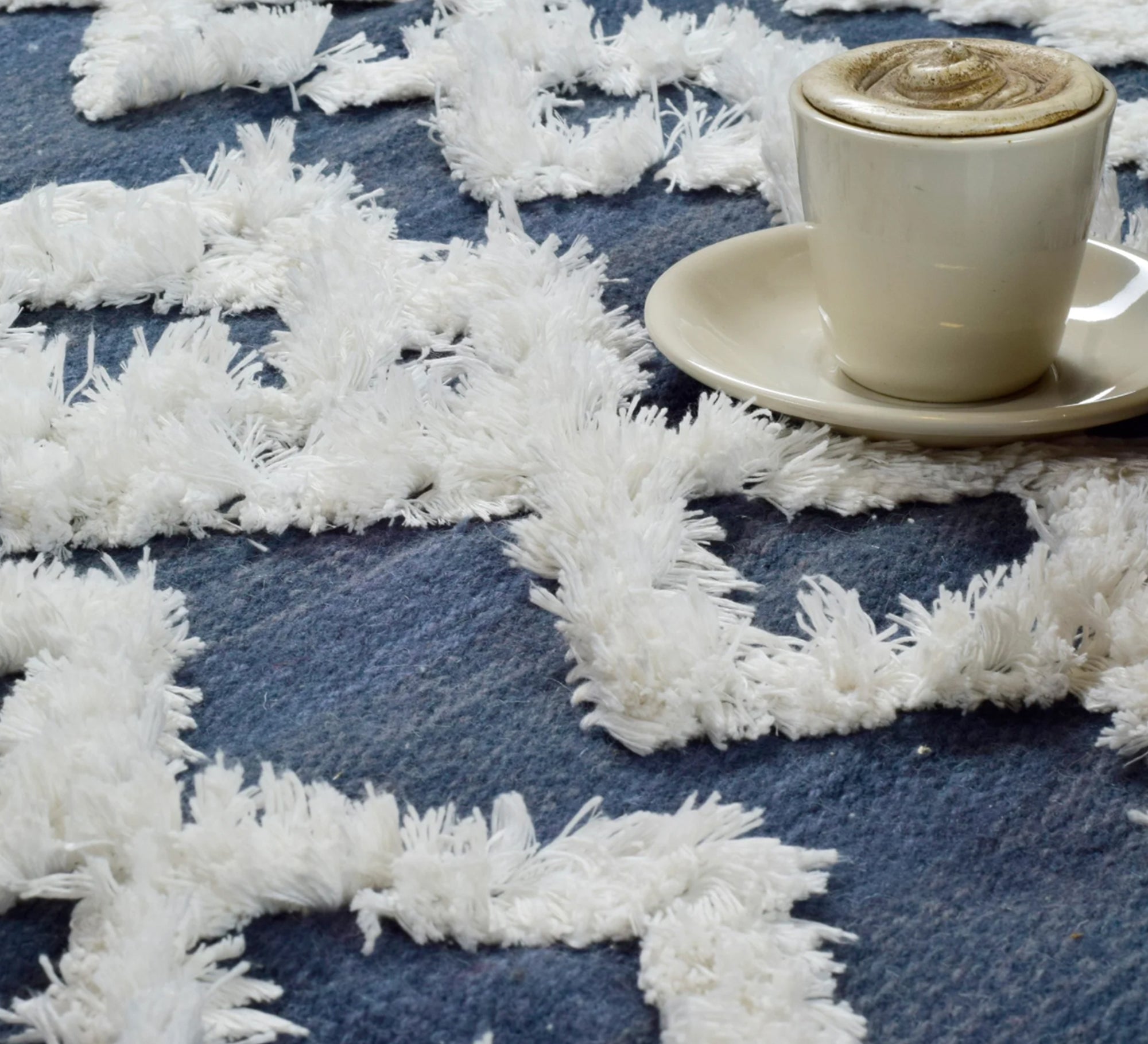 A navy rug that offers depth and comfort through its diamond pattern and textured pile - Vitrine Furniture - Accessories