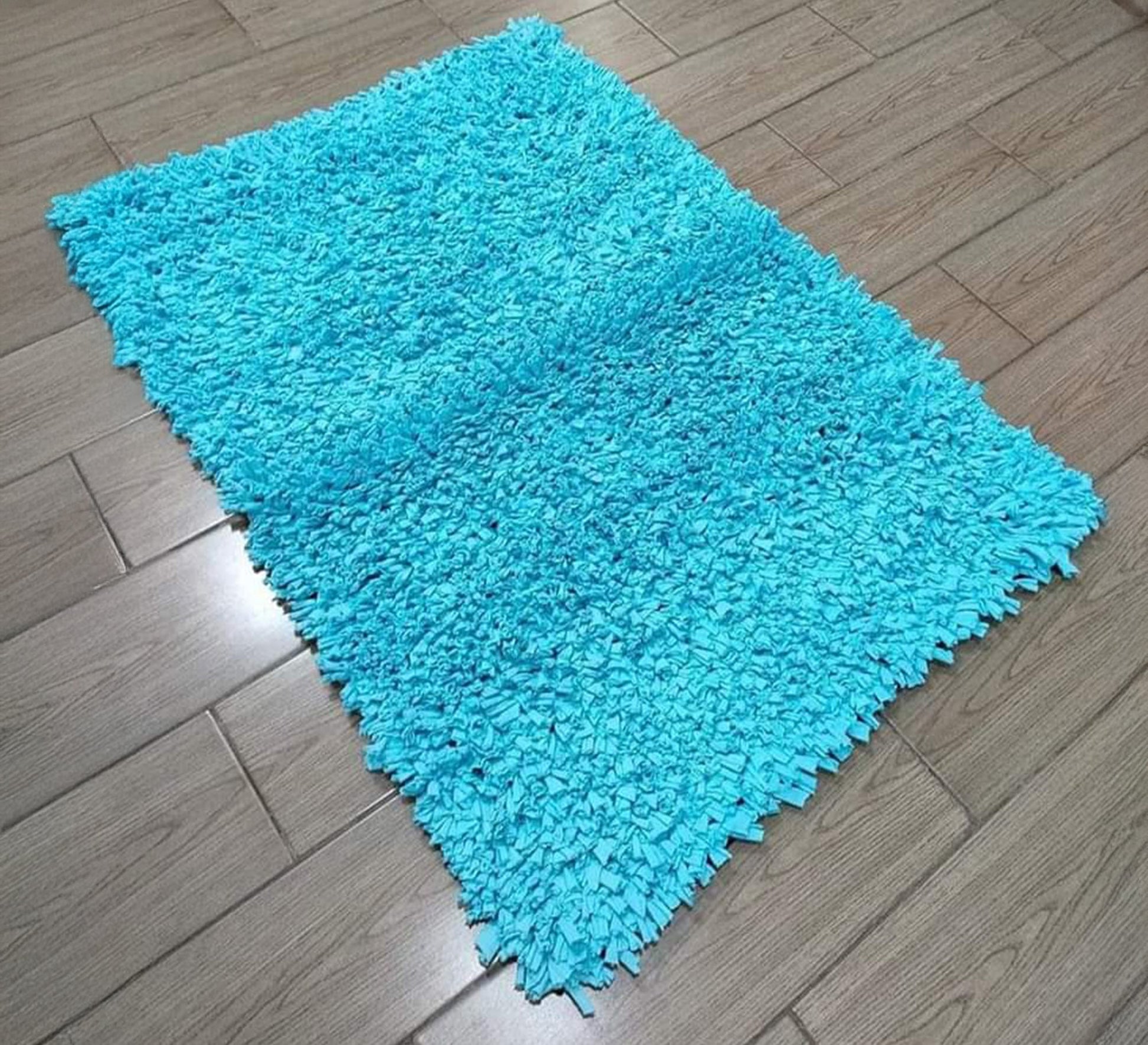 A plush pile rug in cheerful light blue. - Vitrine Furniture - Accessories