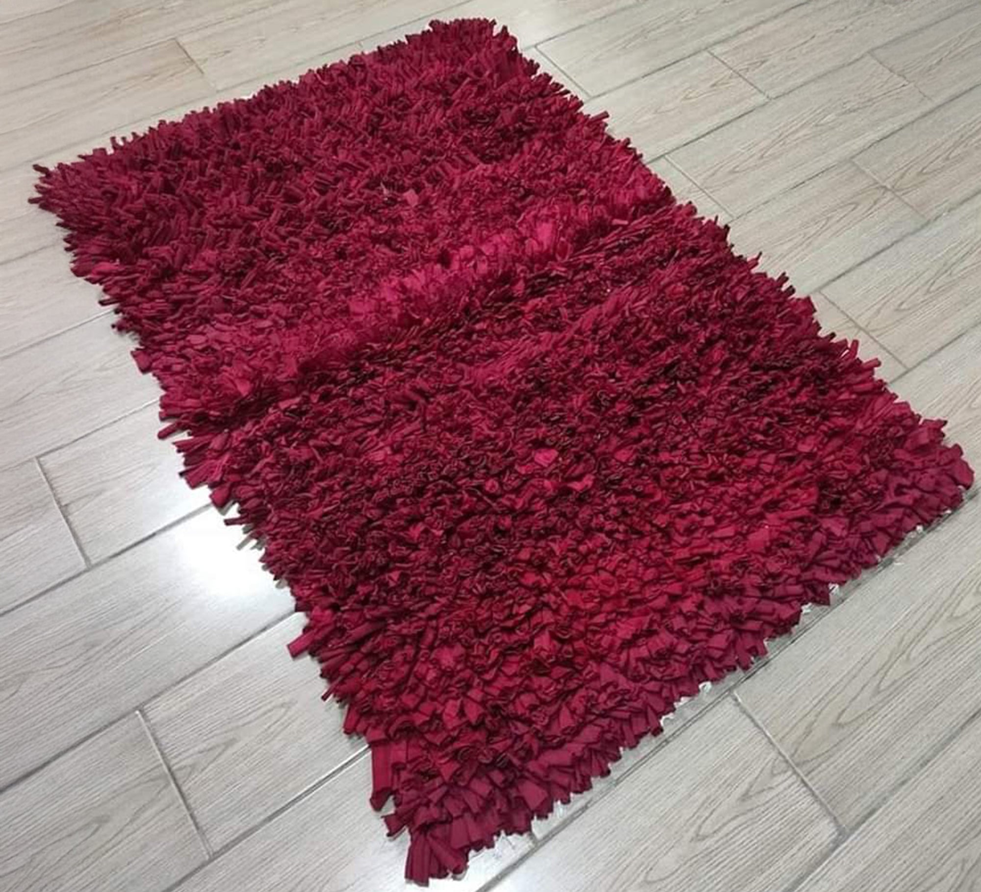 A plush pile rug in elegant red. - Vitrine Furniture - Accessories