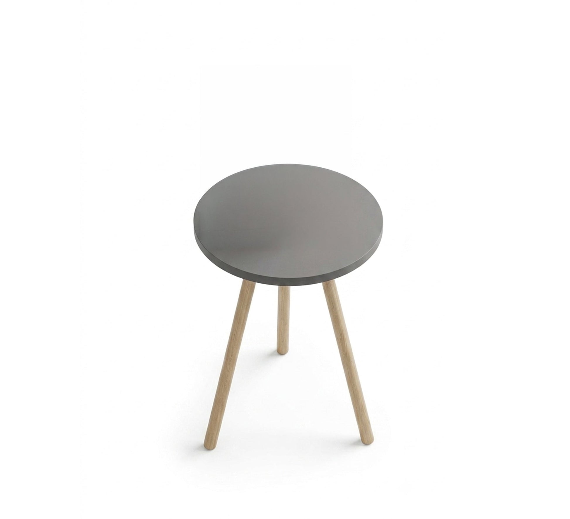 A round table adds a warm touch to the relaxation corner. - Vitrine Furniture - Side Tables