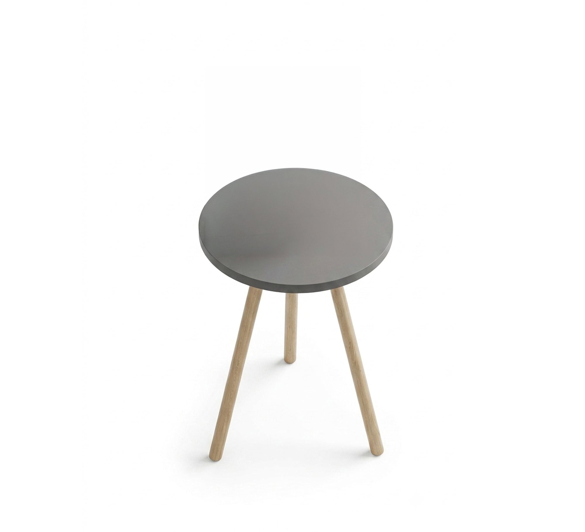 A round table adds a warm touch to the relaxation corner. - Vitrine Furniture - Side Tables