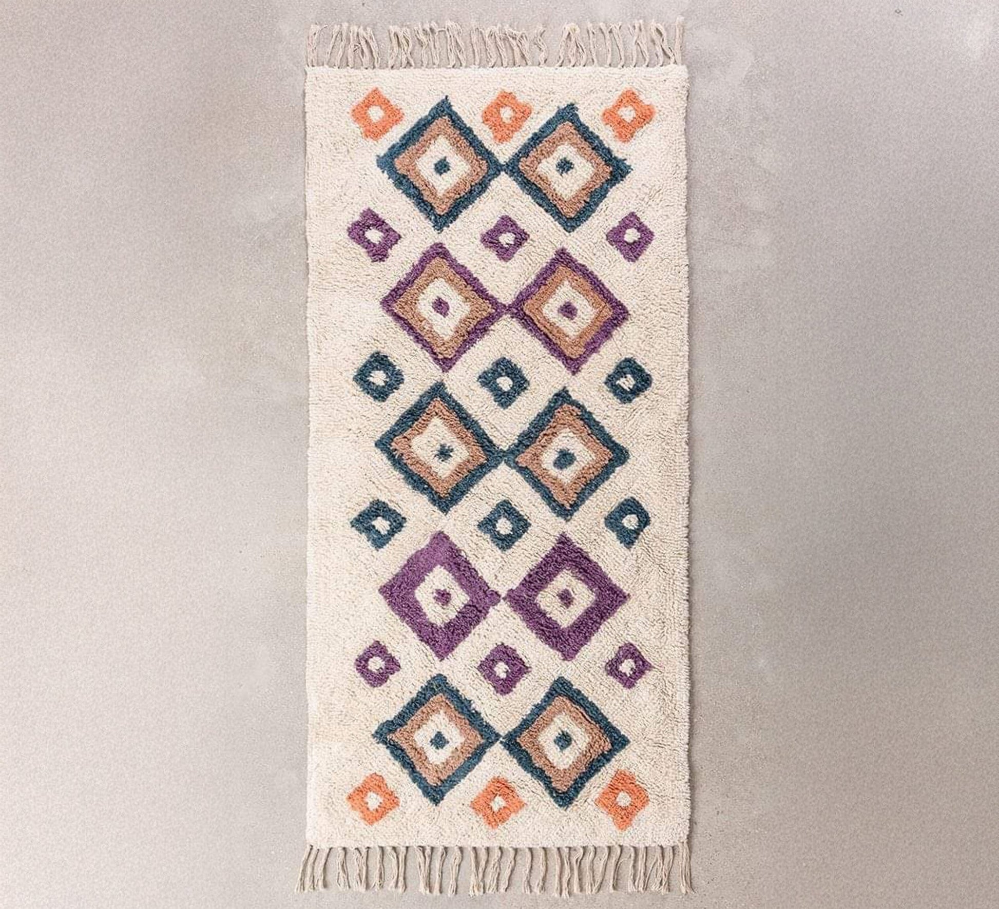 A rug in a variety of bold colors - Vitrine Furniture - Accessories