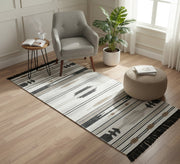 A rug with a modern black and white design - Vitrine Furniture - Accessories