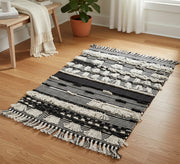 A rug with a rich design featuring woven and embossed patterns - Vitrine Furniture - Accessories
