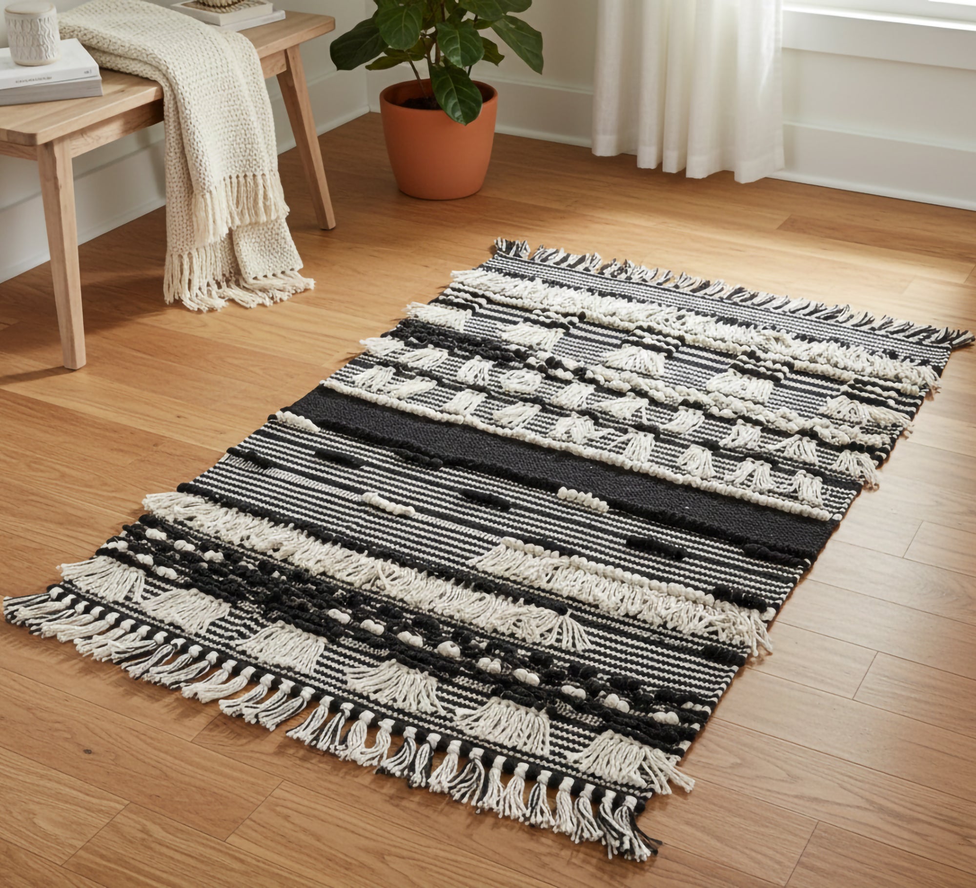 A rug with a rich design featuring woven and embossed patterns - Vitrine Furniture - Accessories