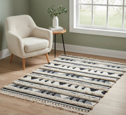 A rug with white stripes and triangular patterns - Vitrine Furniture - Accessories