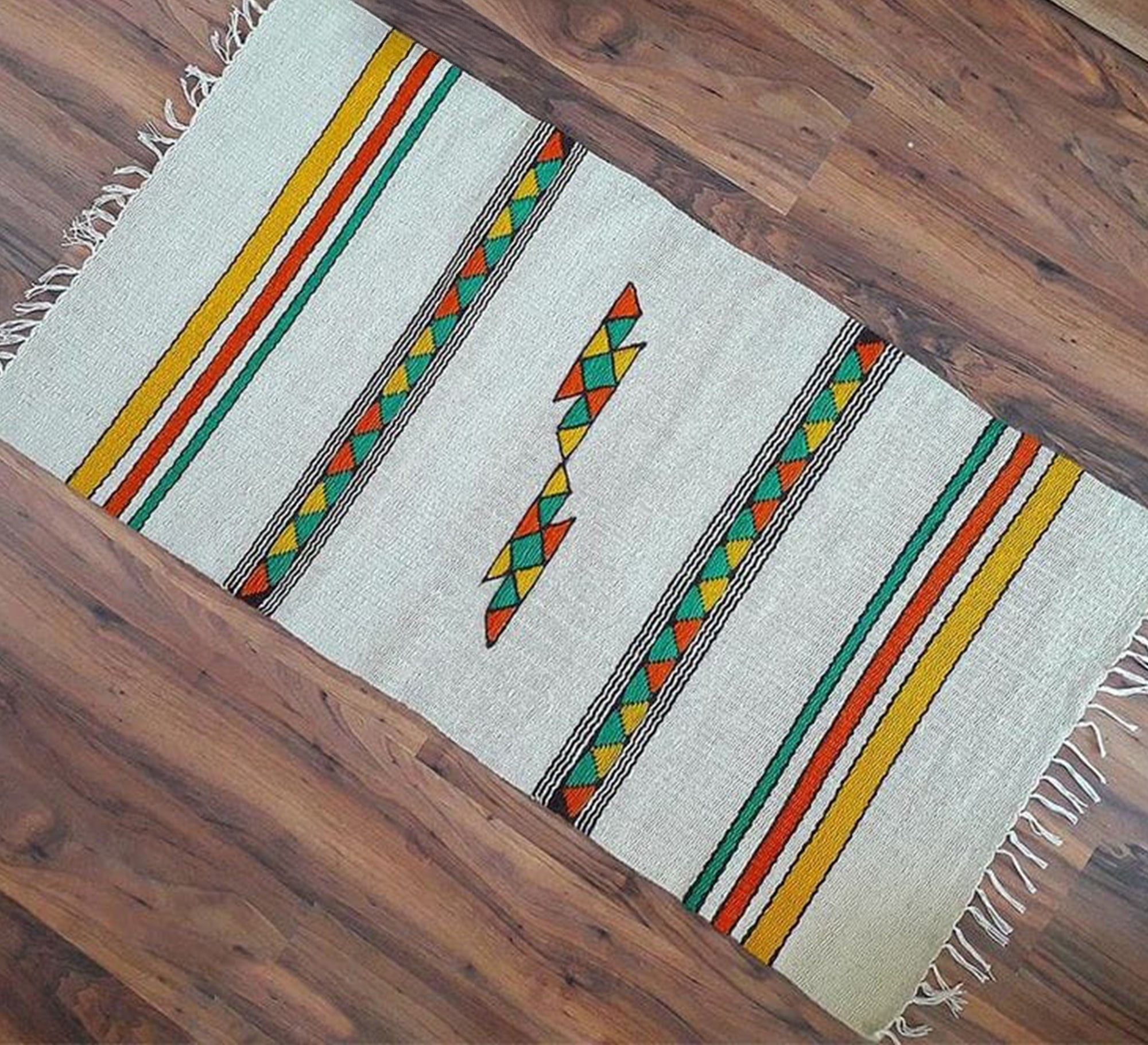 A rug woven with multi - colored wool blocks - Vitrine Furniture - Accessories