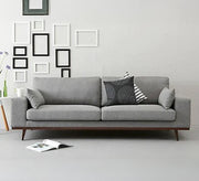 A sofa with tapered, slanted legs - Vitrine Furniture - Furniture