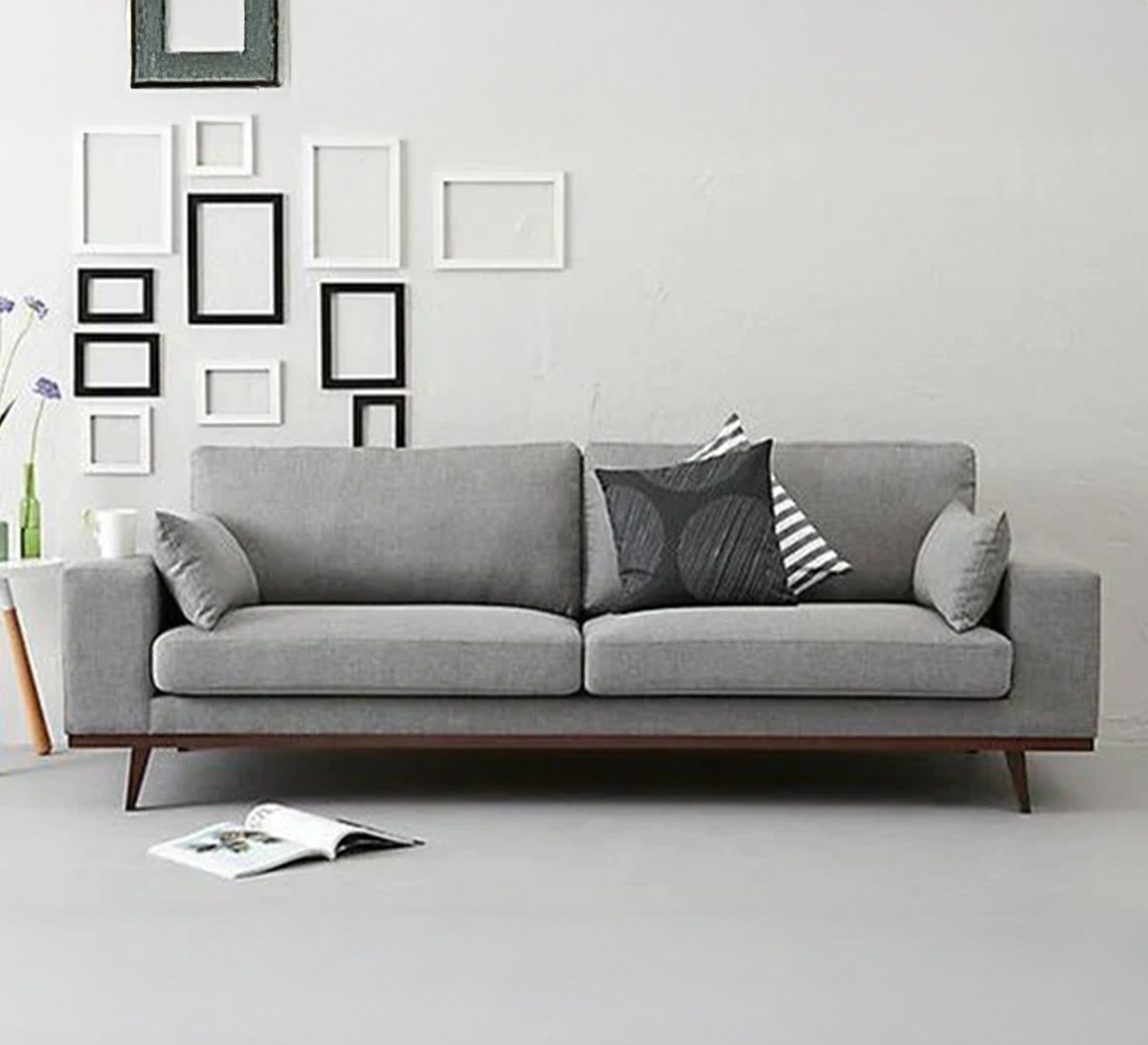 A sofa with tapered, slanted legs - Vitrine Furniture - Furniture