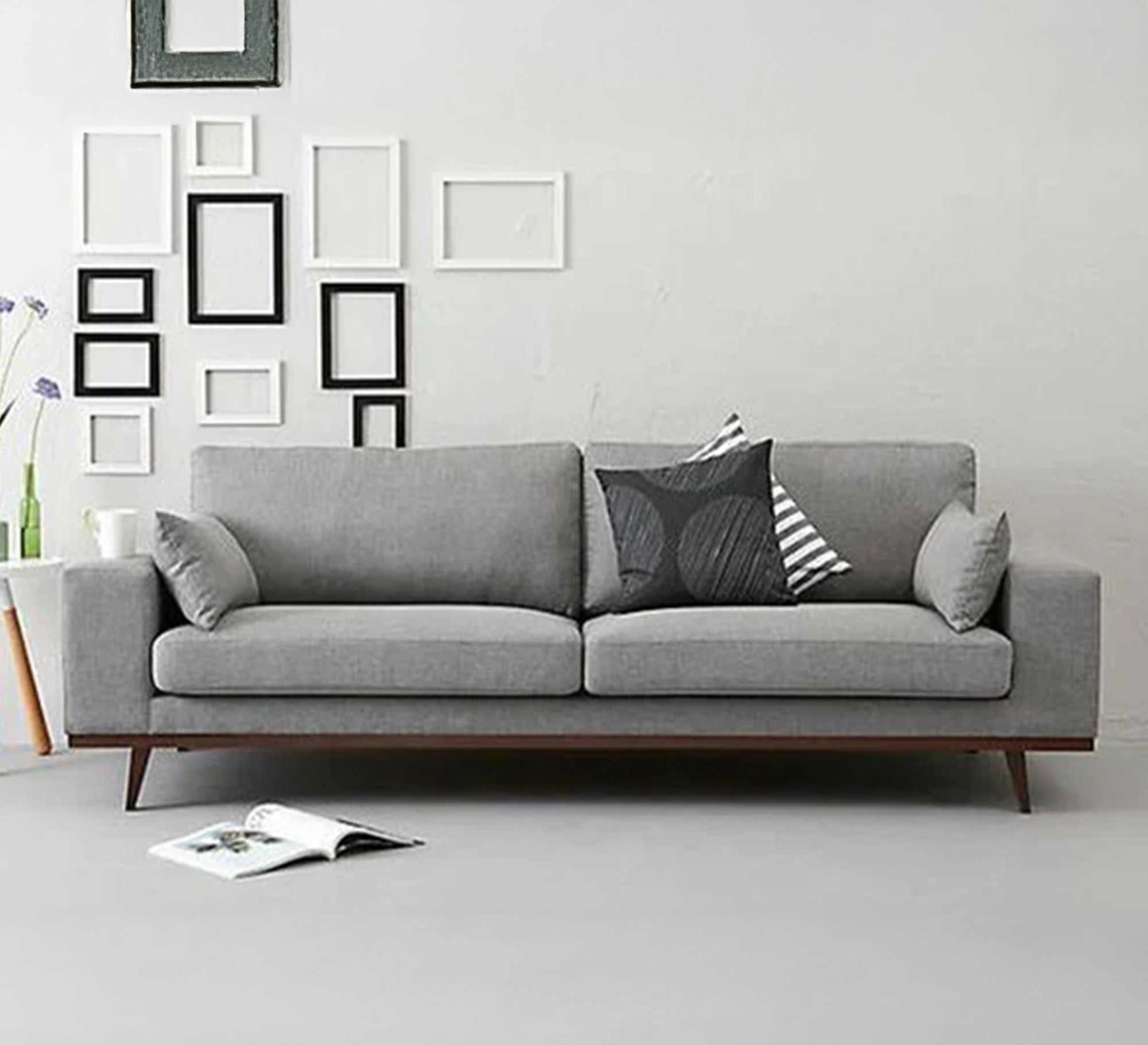 A sofa with tapered, slanted legs - Vitrine Furniture - Furniture