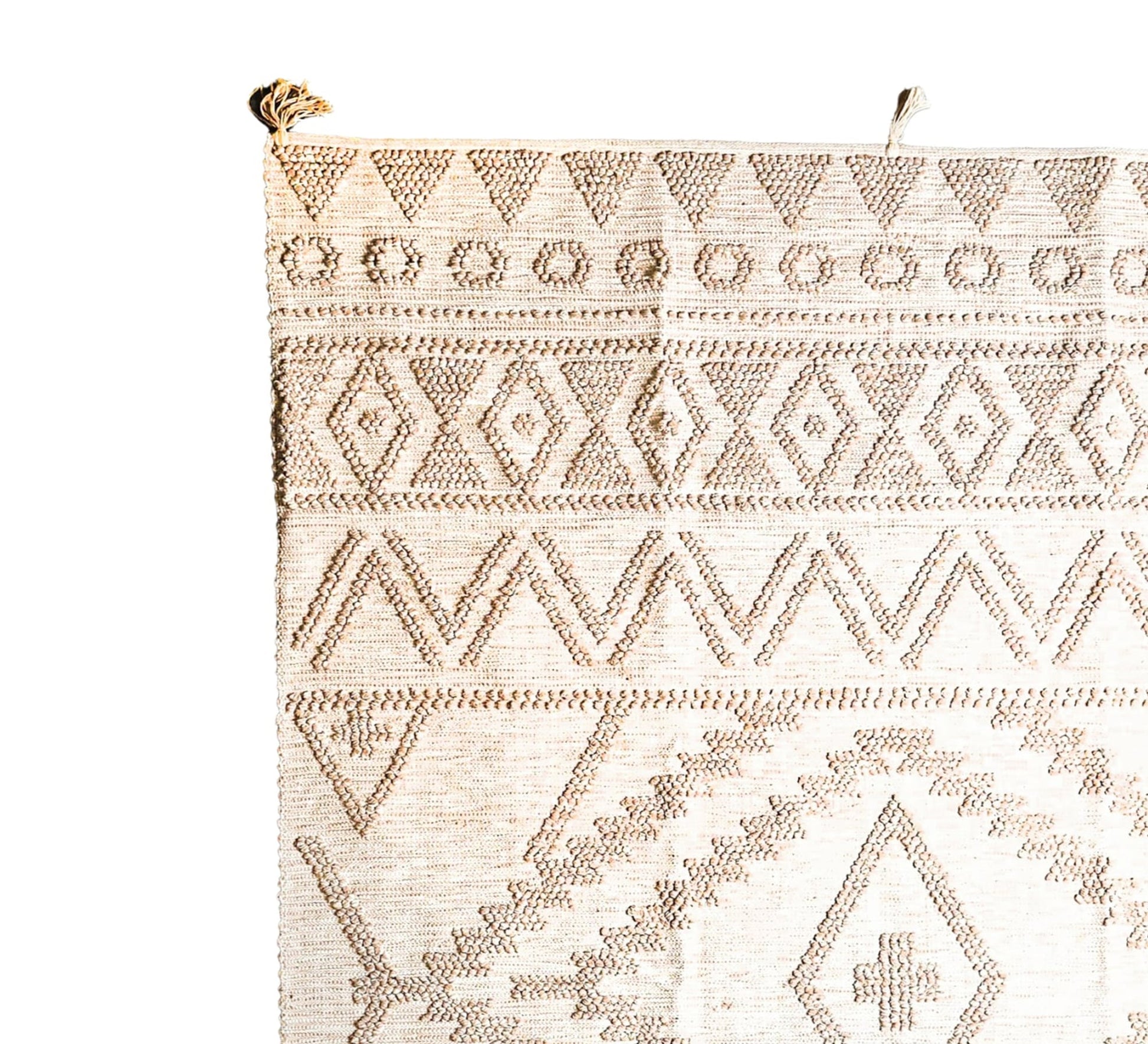 A stylish natural rug with a distinctive texture, featuring geometric designs and bohemian motifs - Vitrine Furniture - Accessories