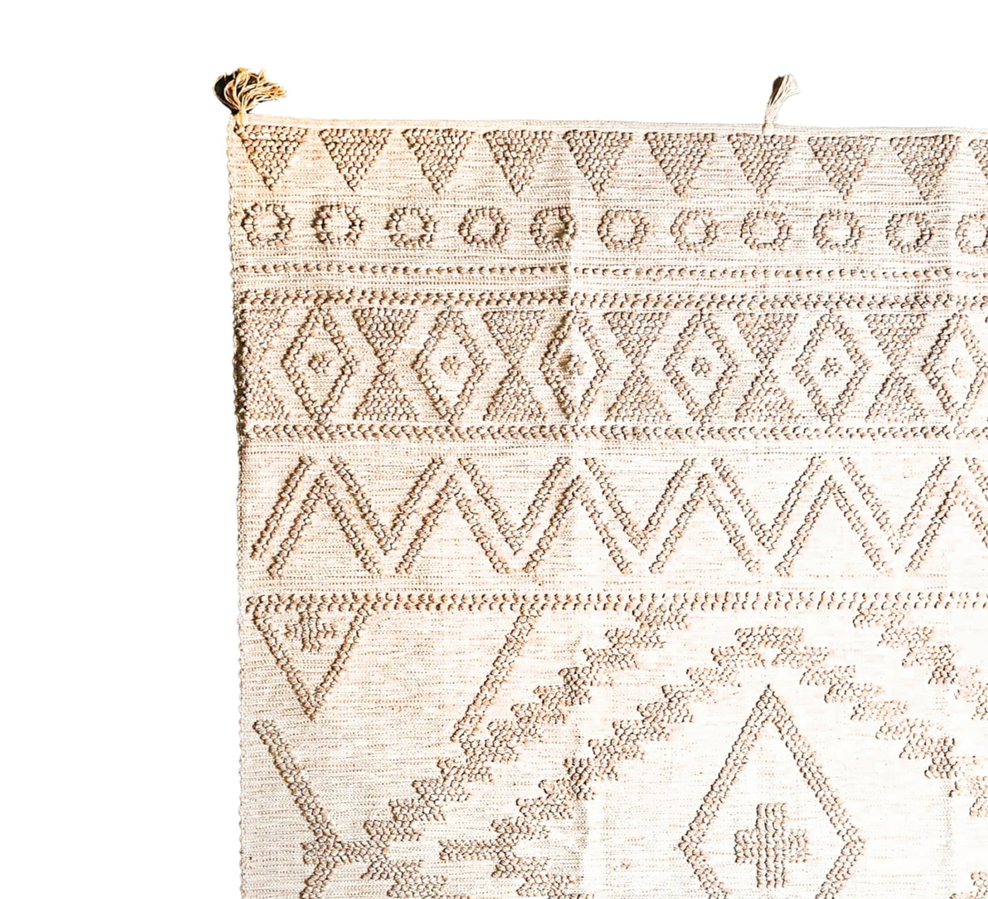 A stylish natural rug with a distinctive texture, featuring geometric designs and bohemian motifs - Vitrine Furniture - Accessories