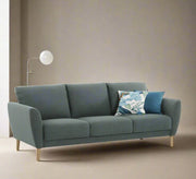 A three - seater sofa - Vitrine Furniture - Furniture