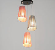 A three - unit pendant lamp with a ceiling - mounted base - Vitrine Furniture - Lighting