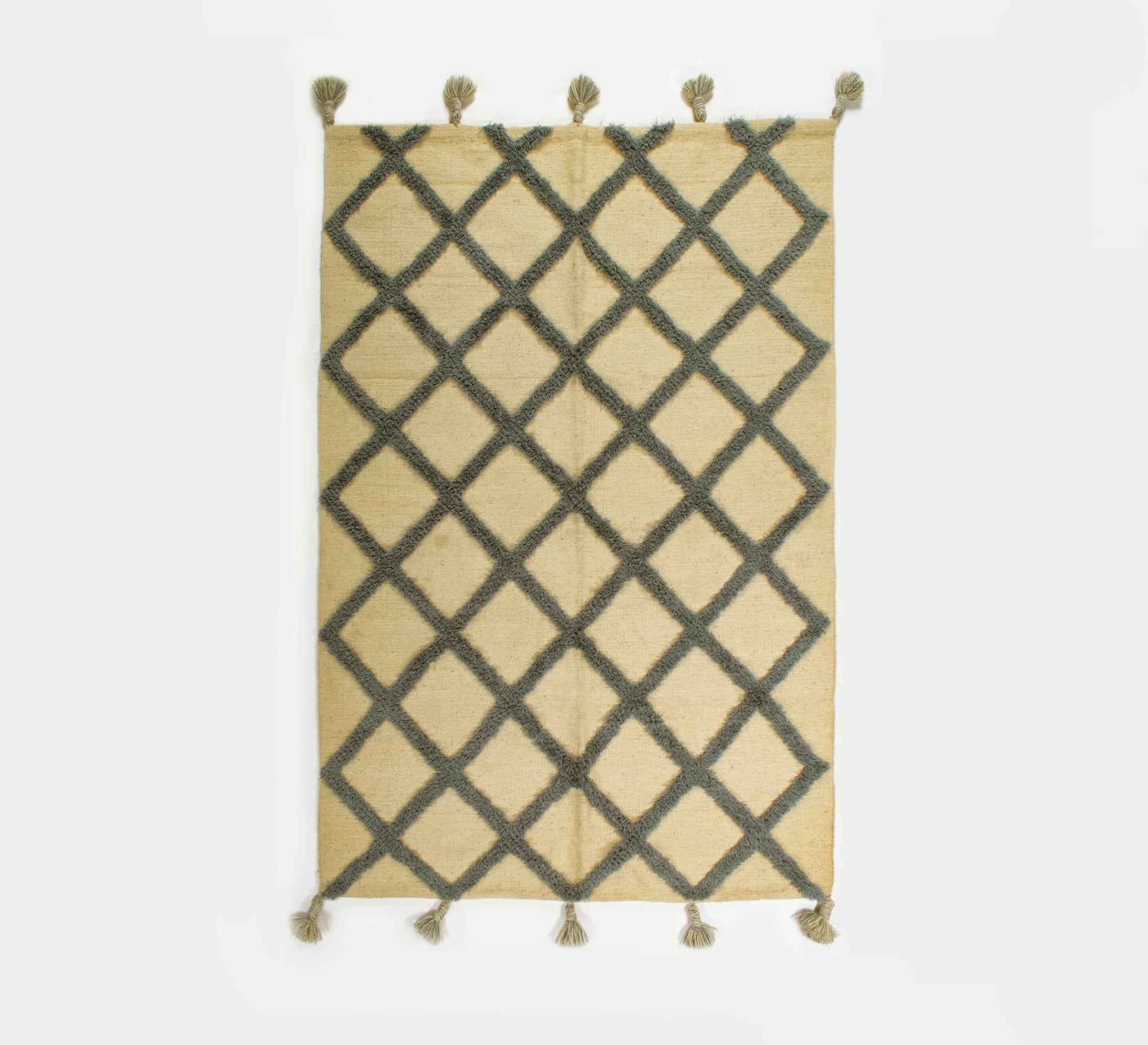 A wool rug with a diamond pattern and decorative fringe - Vitrine Furniture - Accessories