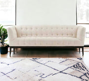 Beige sofa with caputin beads - Vitrine Furniture - Furniture