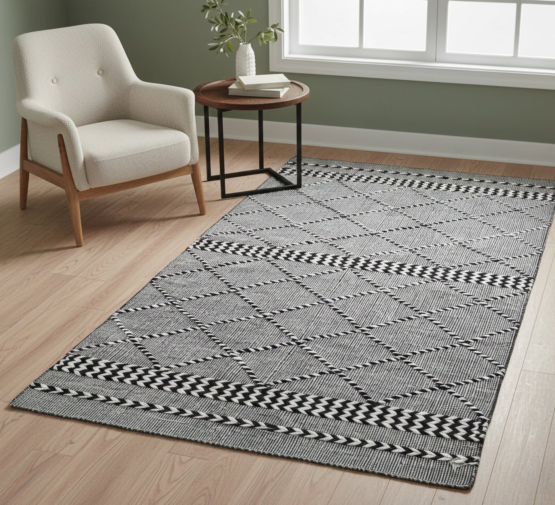 Black and gray rug with a repeating diagonal pattern - Vitrine Furniture - Accessories