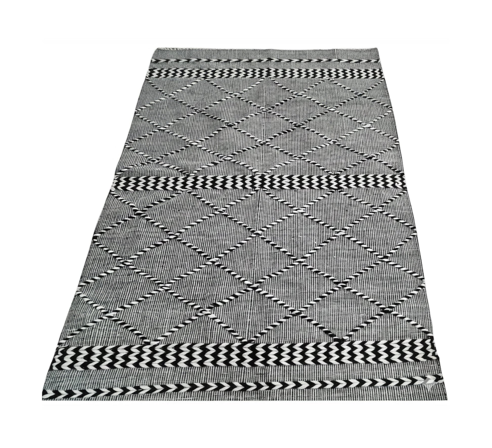 Black and gray rug with a repeating diagonal pattern - Vitrine Furniture - Accessories
