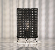 Black cylindrical table lighting with a hollow grid pattern - Vitrine Furniture - Lighting