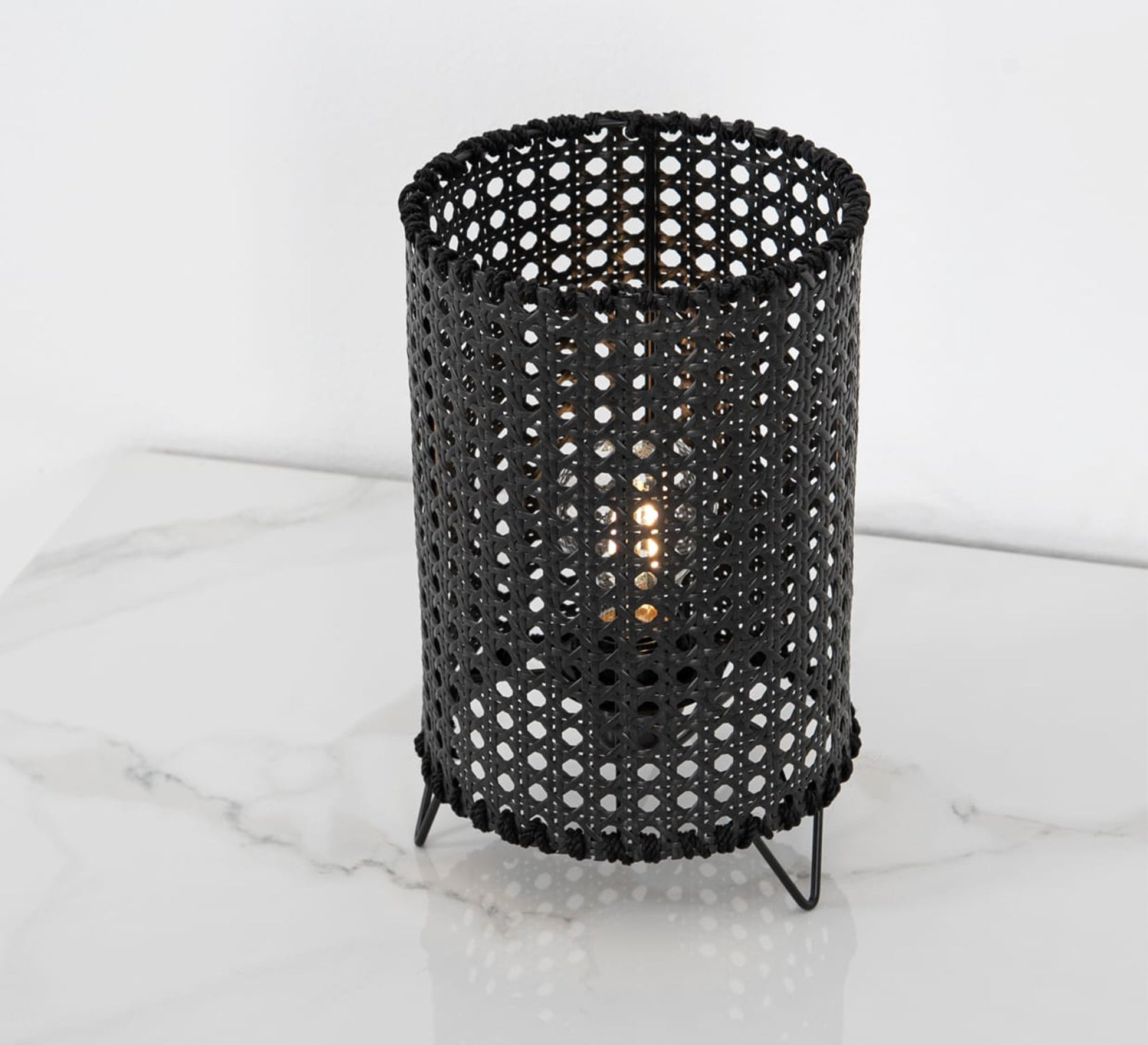 Black cylindrical table lighting with a hollow grid pattern - Vitrine Furniture - Lighting