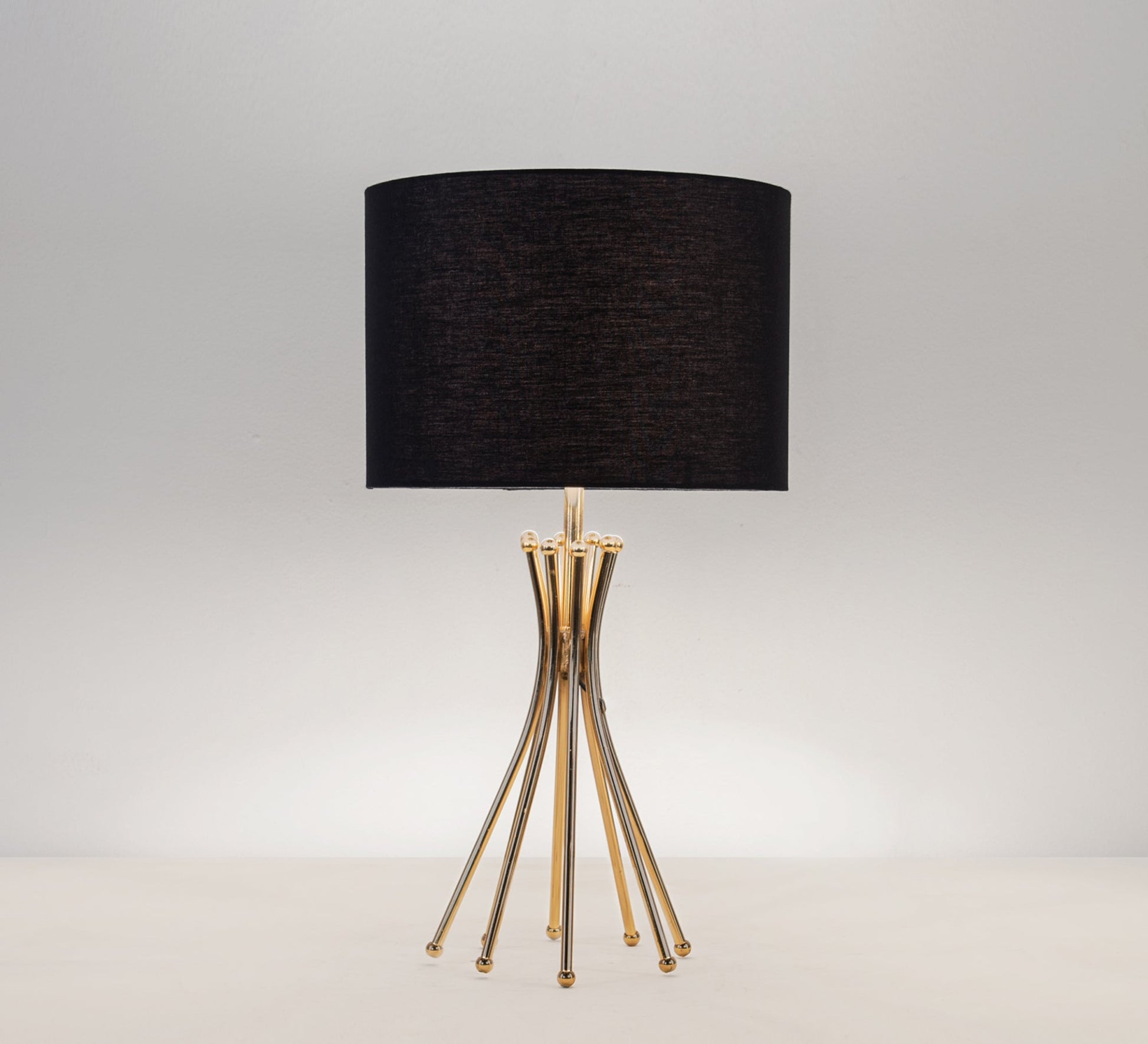 Black table lamp with a gold base - Vitrine Furniture - Lighting