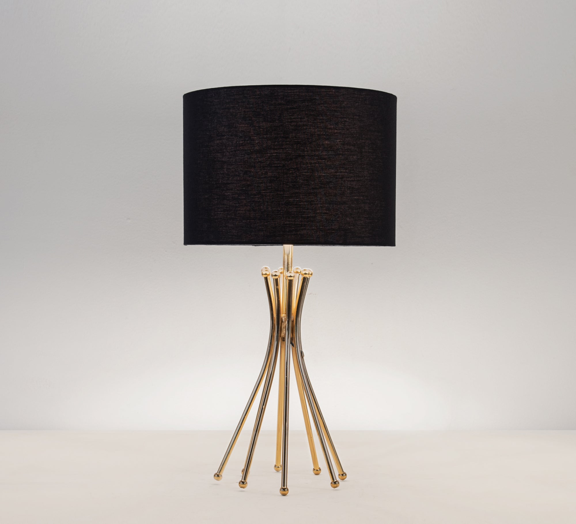 Black table lamp with a gold base - Vitrine Furniture - Lighting
