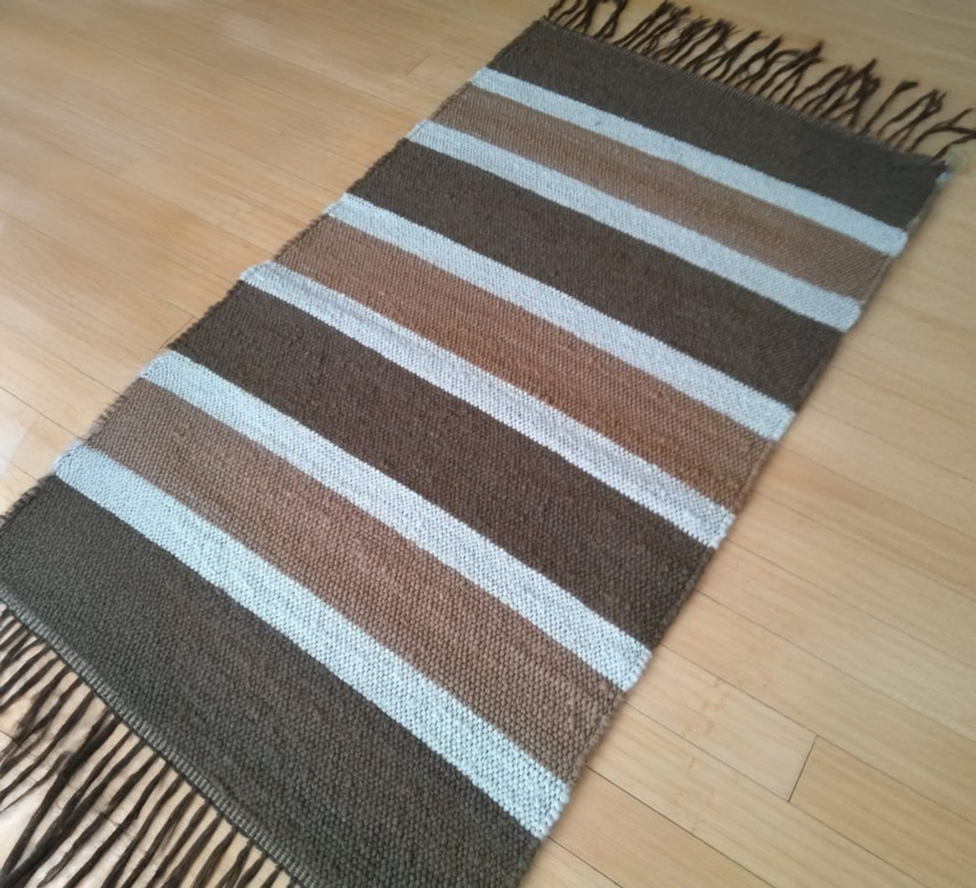 Brown striped rug in strong earth tones - Vitrine Furniture - Accessories