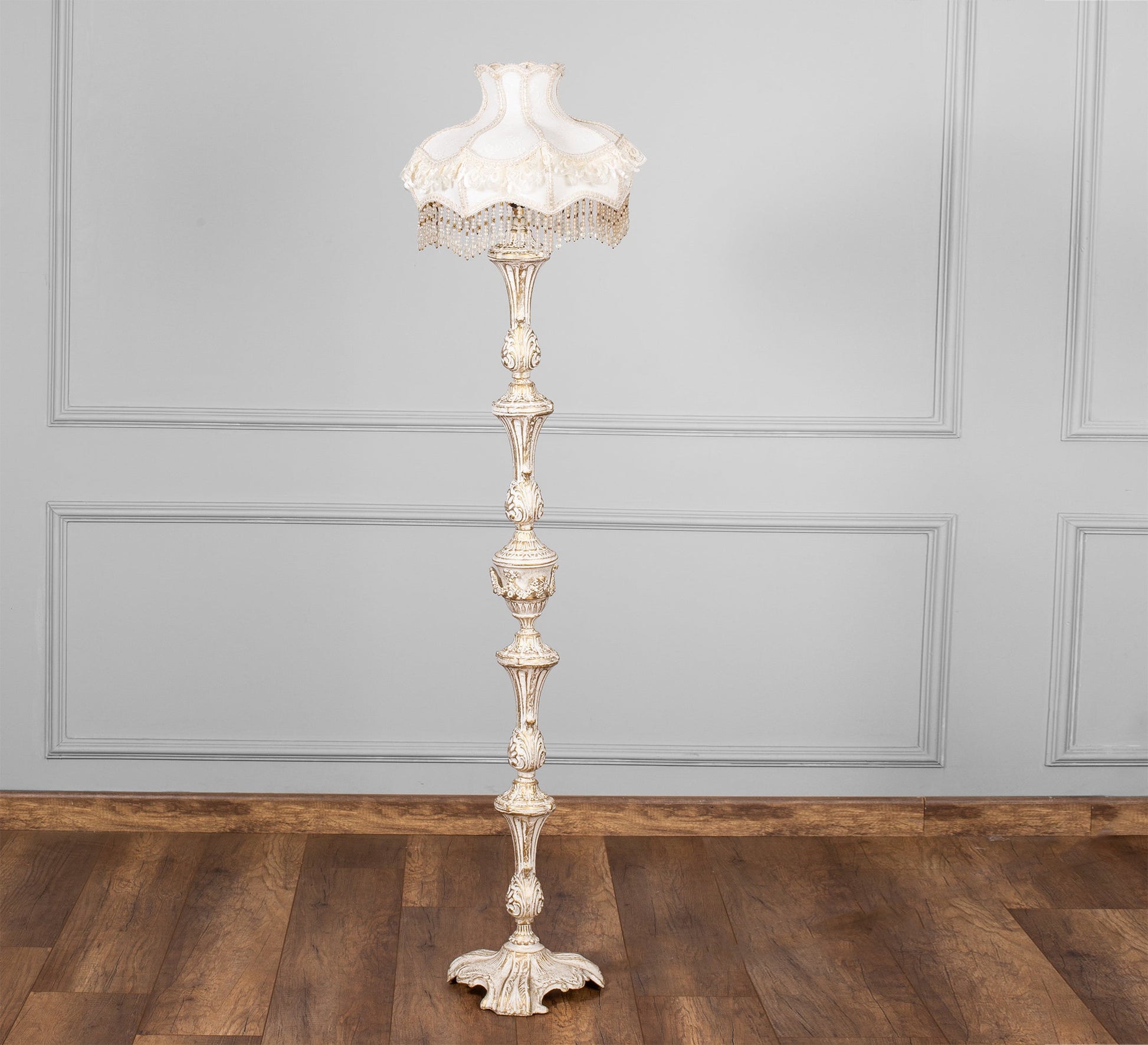 Carved floor lamp adds a classic touch. - Vitrine Furniture - Lighting