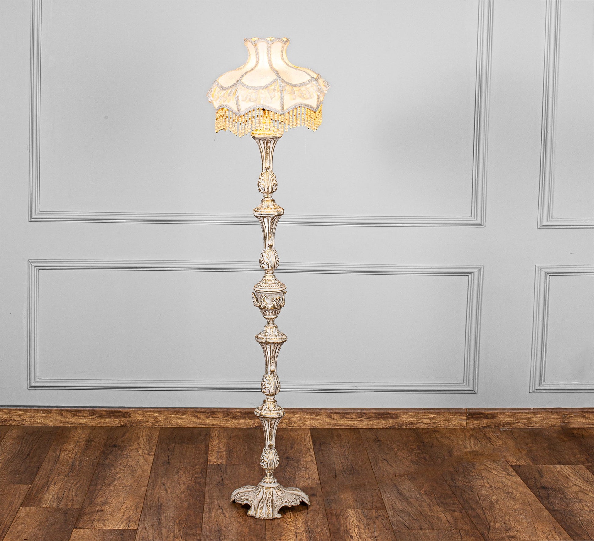 Carved floor lamp adds a classic touch. - Vitrine Furniture - Lighting