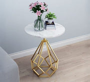 Circular side table with a gold base - Vitrine Furniture - Furniture