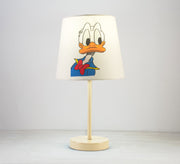 Donald Duck Lamp: A fun, classic touch for a nursery with a beige base. - Vitrine Furniture - Lighting