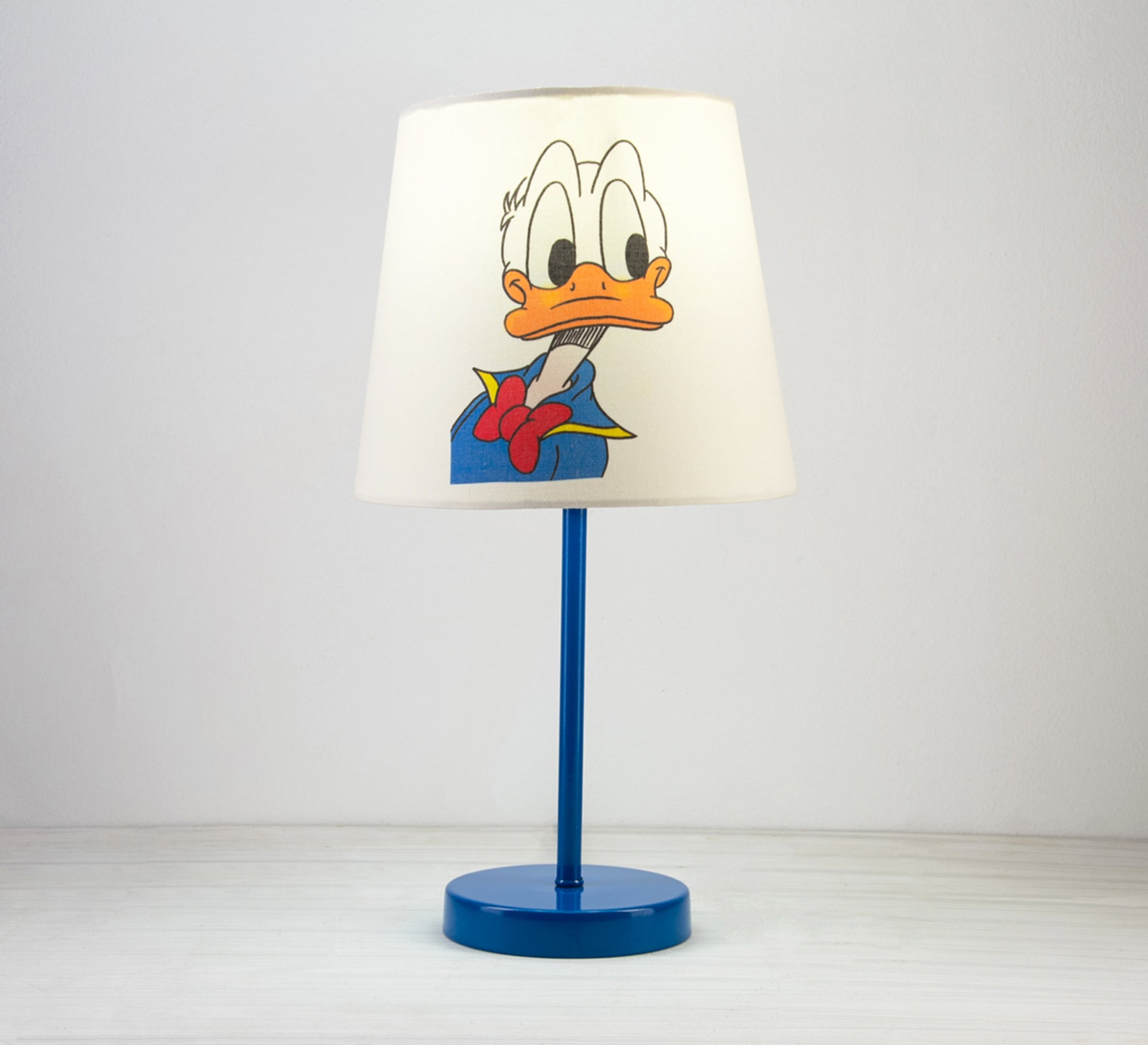 Donald Duck Lamp: A fun, classic touch for a nursery with a blue base. - Vitrine Furniture - Lighting