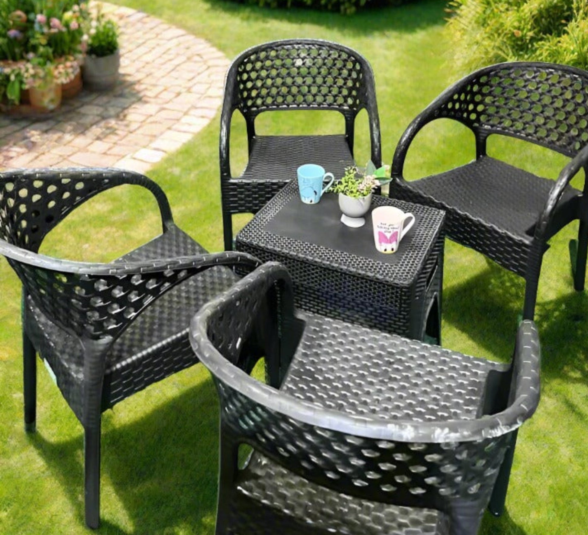 Four plastic chairs and a small black garden table - Vitrine Furniture - Outdoor Products