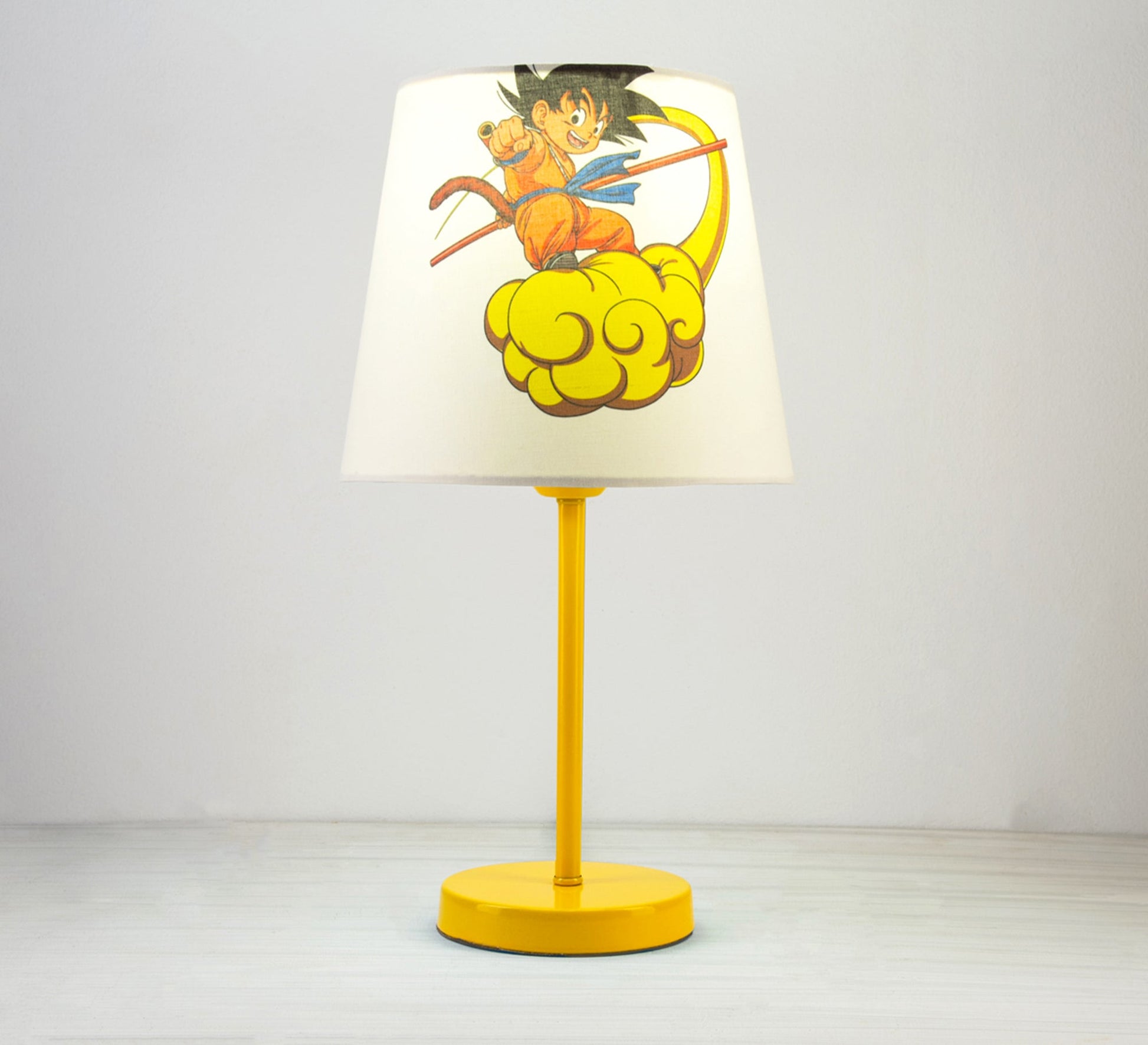 Goku Lamp: The anime hero lights up your room with a golden base. - Vitrine Furniture - Lighting