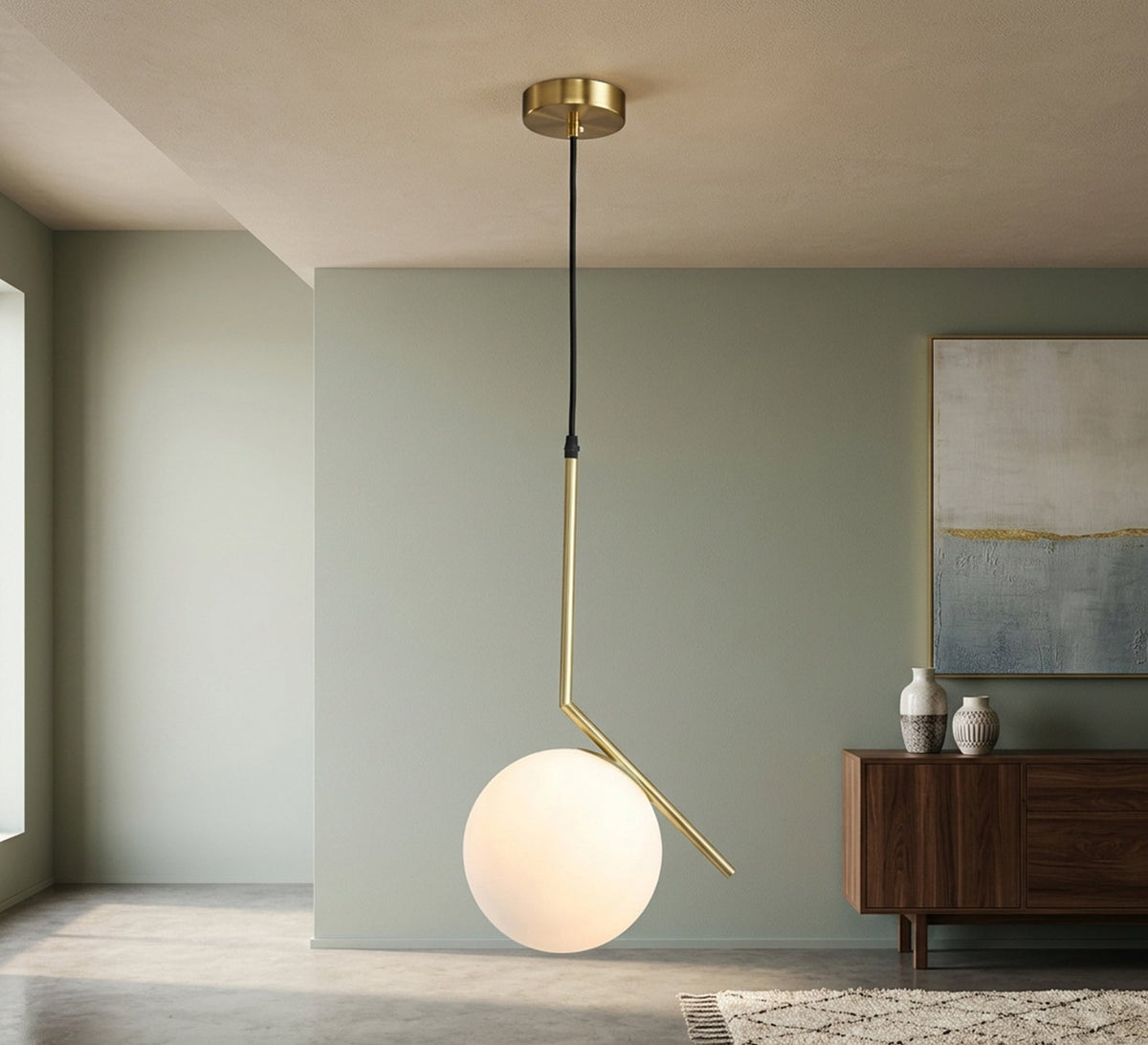 Gold pendant with an angled arm and a glass globe - Vitrine Furniture - Ceiling lights