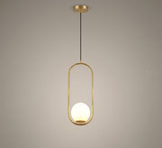 Gold pendant with an oval frame and a glass globe - Vitrine Furniture - Ceiling lights