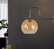 Honey - colored spherical metal and glass pendant lamp - Vitrine Furniture - Lighting