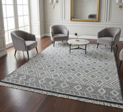 Light - colored rug with a white geometric diamond pattern - Vitrine Furniture - Accessories
