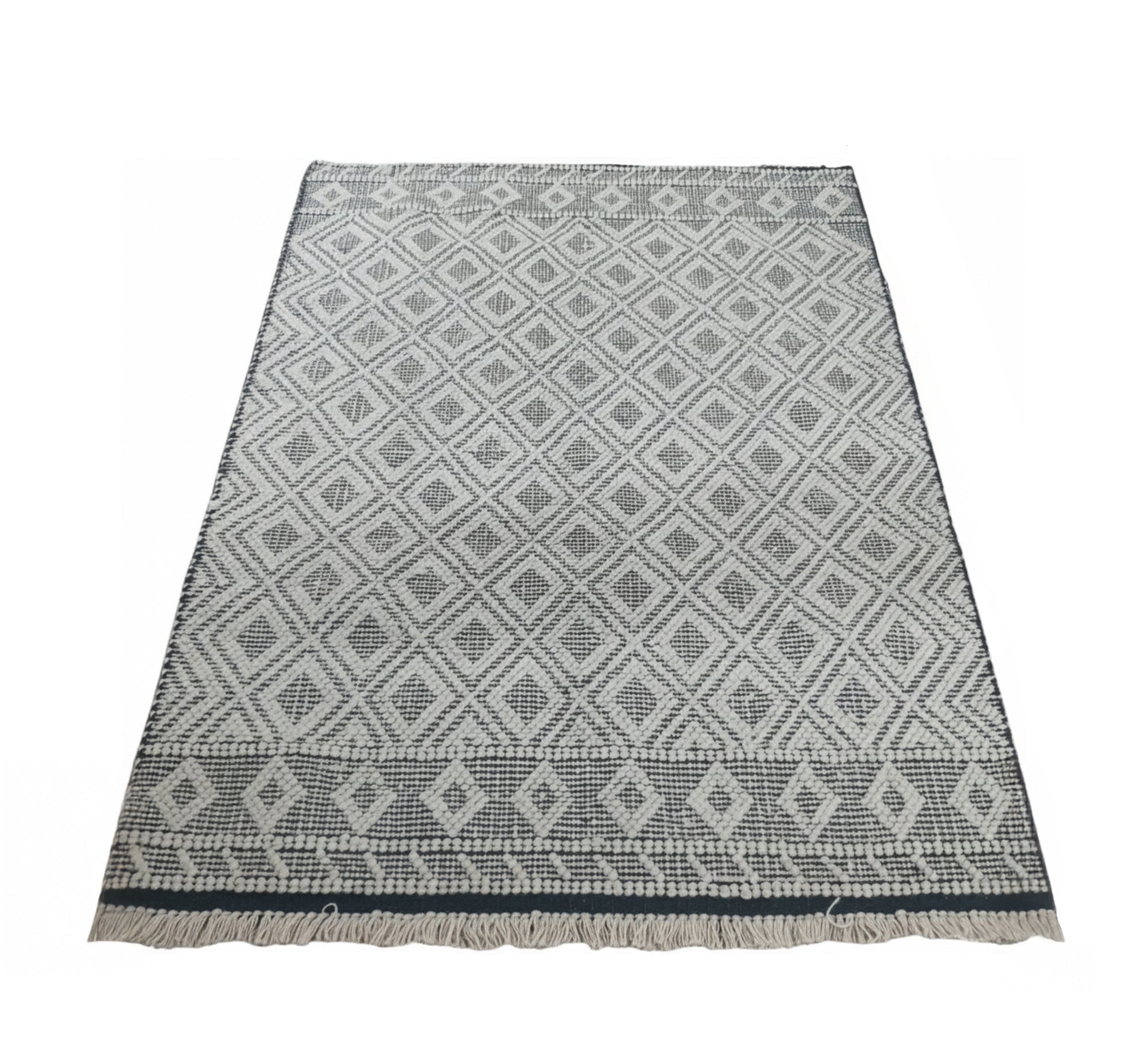 Light - colored rug with a white geometric diamond pattern - Vitrine Furniture - Accessories