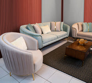 Living room with round armrests covered in elegant gold accents - Vitrine Furniture - Living room sets