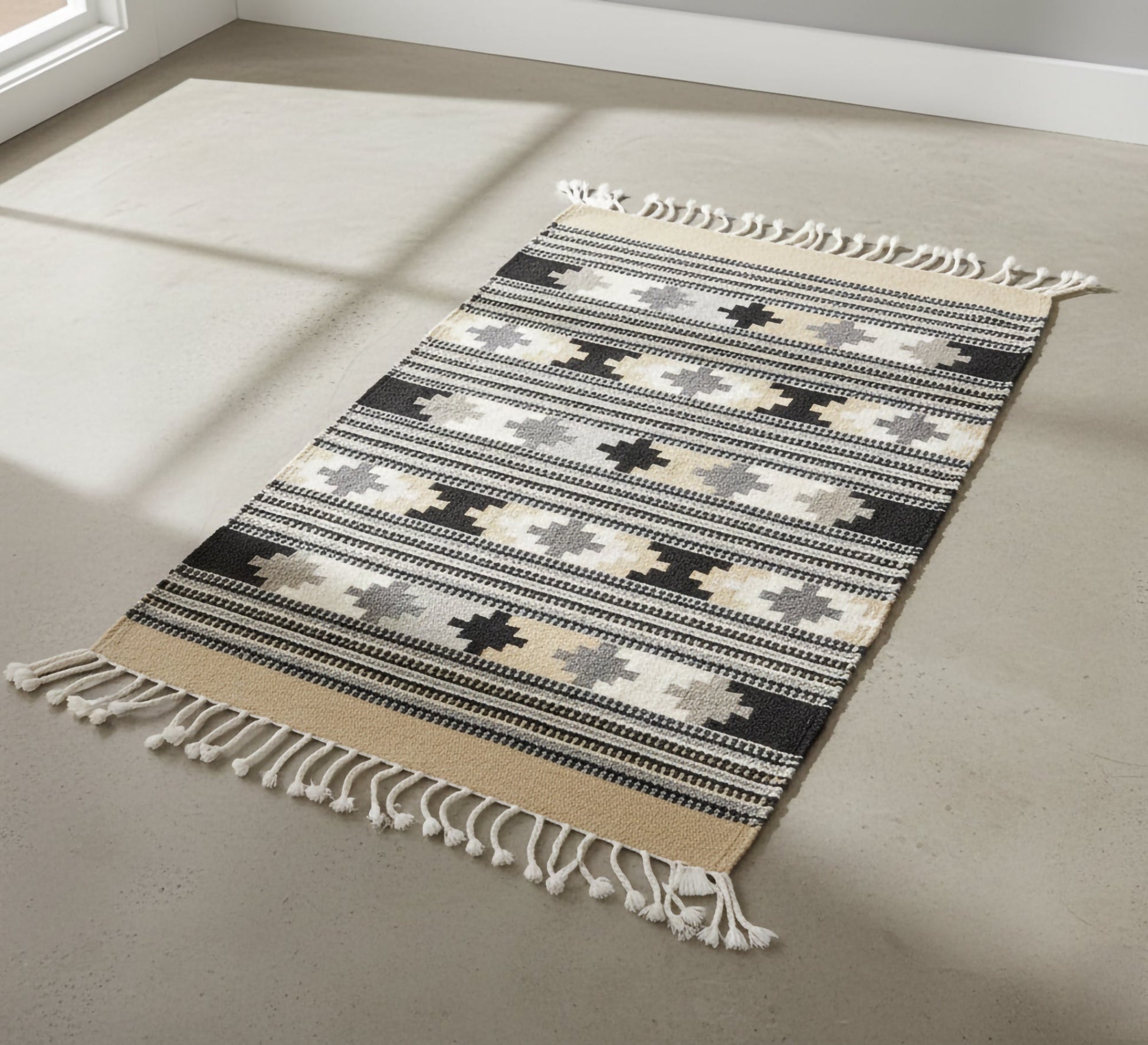 Sand - colored star pattern rug - Vitrine Furniture - Accessories