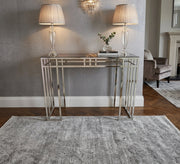 Stainless steel console decorated with successive sticks - Vitrine Furniture - Console